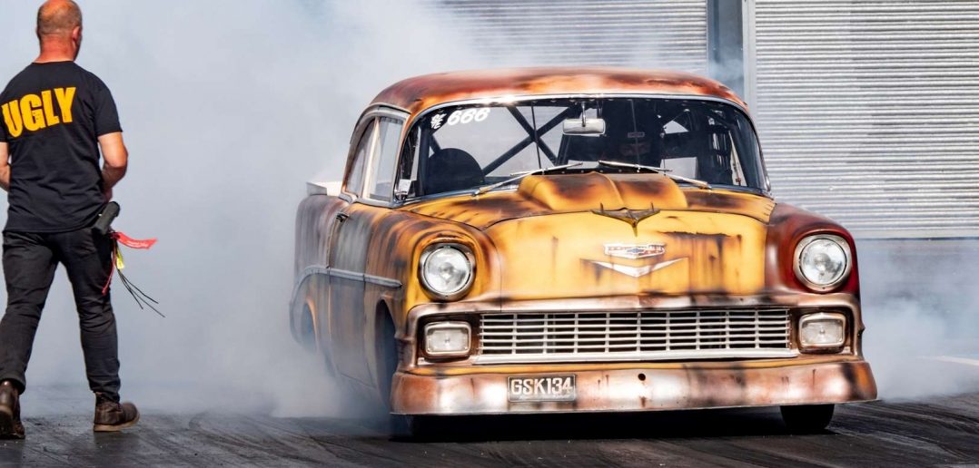 Andy Bond warms the tyres in his 200mph Ugly Sister Chevy